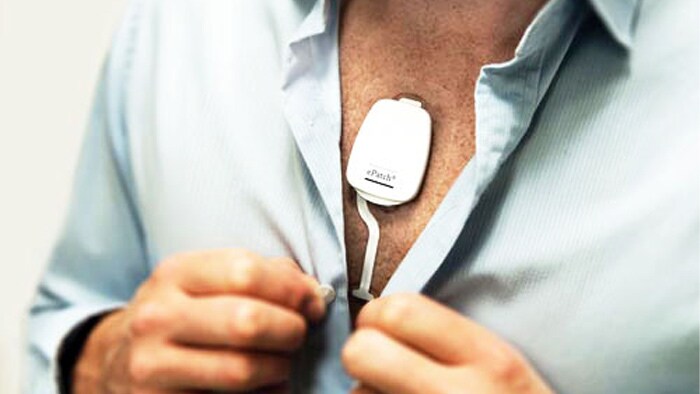 a person with a device attached to his chest